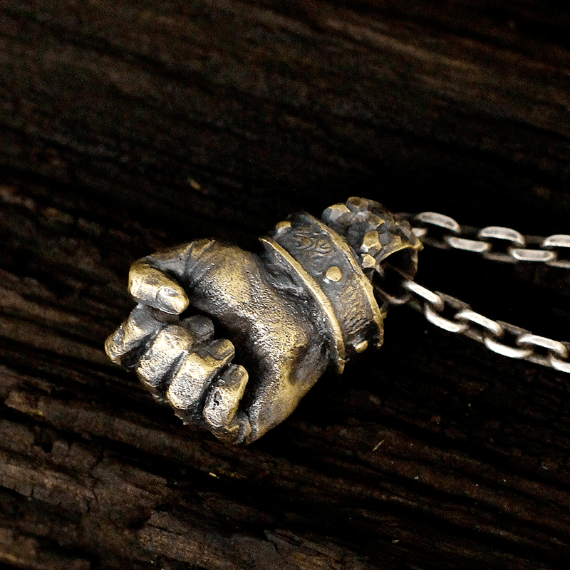 Powerful Fist of Fate Hammering Gesture Necklace